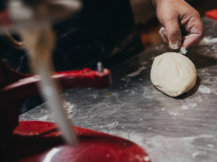 slashing dough in the Sourdough Class in NSW